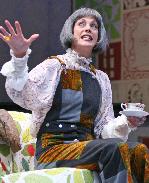 Wendie Malick as Madame Arcati in Blithe Spirit