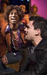 Rodney Hicks (Valentine) and Ivan Hernandez (Proteus) in Irene Lewis' production of the MacDermot/Guare/Shapiro musical adaptation of Shakespeare's <I>Two Gentlemen of Verona</I.>  Photo by Richard Anderson.